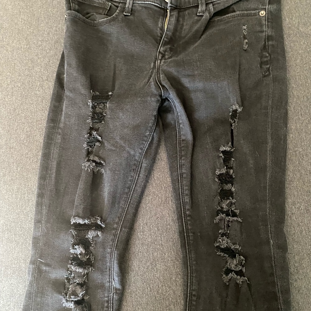 Express distressed black skinny jeans